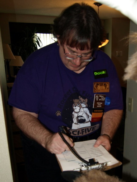 Crim ferret signing the clipboard