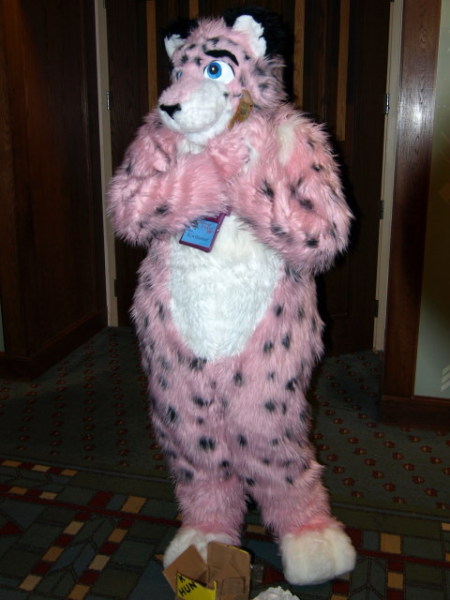 KiwiHunter holding a kiwi (plush toy).