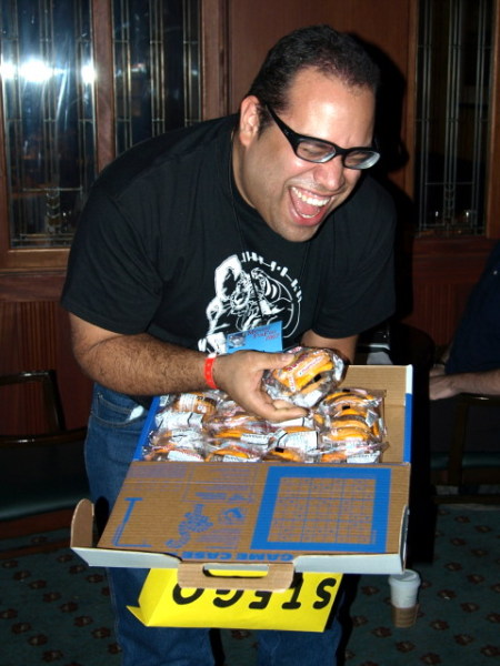 Stego holds a 'burger' from the Crave Case
