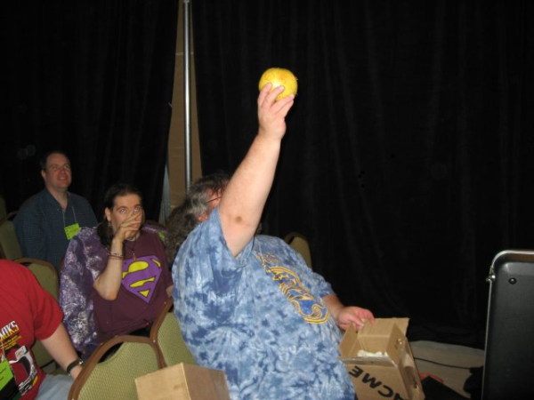 Tom Smith holding aloft the Magical Grapefruit of Love