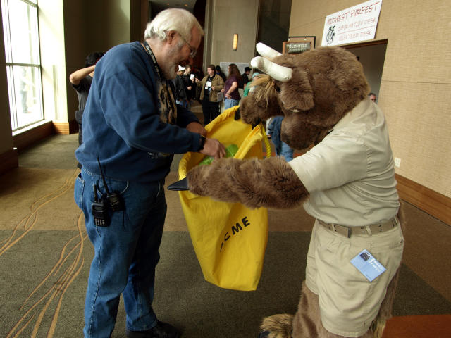 BJ Buttons removing something from the ACME sack.