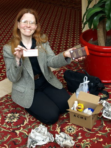 Cathy holding up chocolate bars.