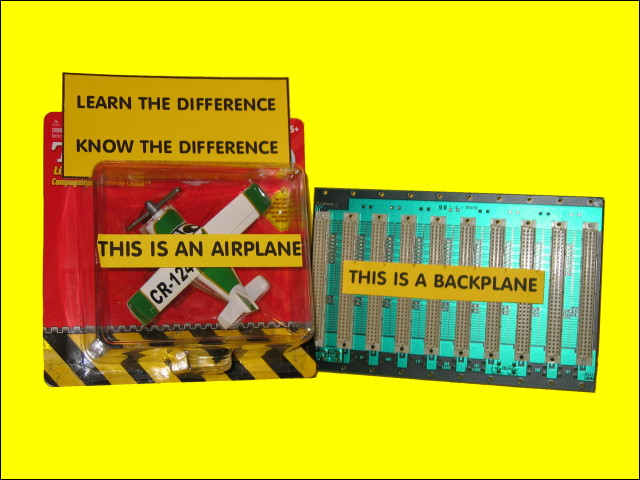 A toy airplane, a backplane, and the card.