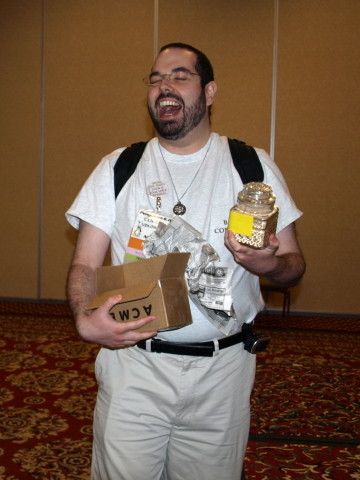 Eliezer holding the jar and laughing