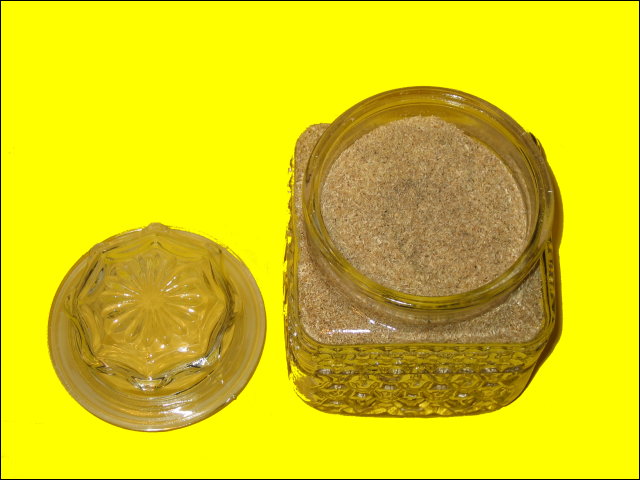 An open jar of sawdust